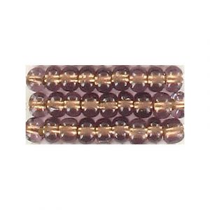 Perles de rocaille, améthyste clair transparent doublé de bronze, grandeur 6. Vendu en paquet de 250 grammes. (SKU# GBR6L/25014)