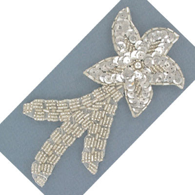 Sequin motifs, silver star (SKU# SMBE231/SI). Sold individually.